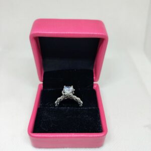 Luminous Embrace  Brilliant Center Stone with Twisted Band Womens Ring