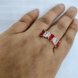 vibrant gold ring adorned with colorful gemstones